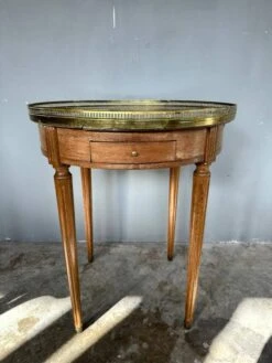 Hot Water Bottle Table With A Marble Top And A Brass Gallery.